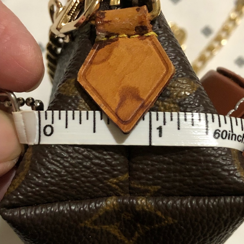 Pochette Metis Monogram